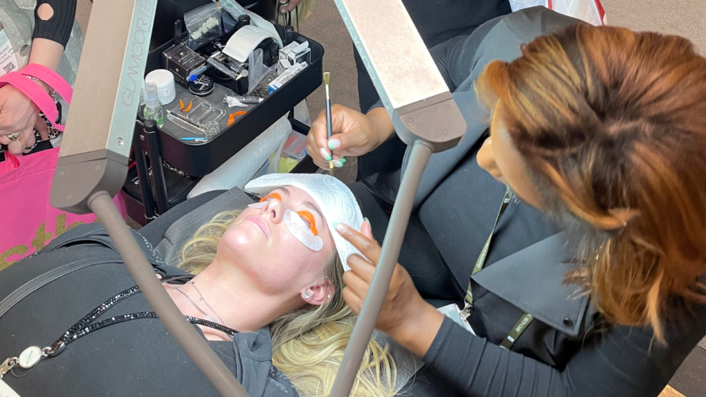 Elleebana Lash & Brow Certification Indiana training. Master trainer is doing lash lift during certification course. Hands-on lash and brow training at Volumabeauty
